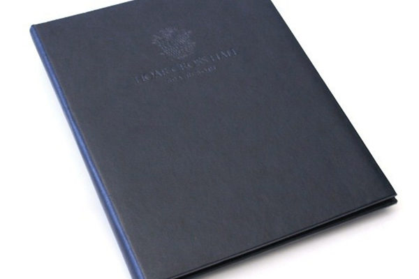 Textured bonded leather menu cover with logo De-Bossed onto the front cover  with hidden inter-screw fixing in the spine.
