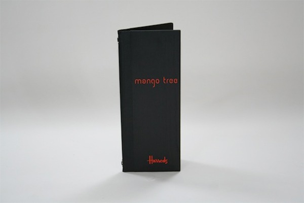 Black wooden menu with laser engraved logo for Mango Tree in Harrods. Cocktail size which takes half A4 width paper but full A4 height.